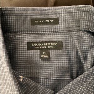 Banana Republic dark blue button up collared long sleeve shirt.